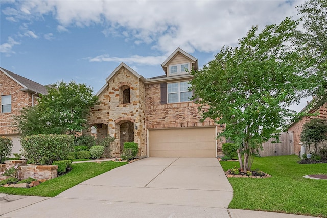 16747 Highland Country Dr, Cypress, TX 77433 - view of front of property with concrete driveway, a garage, stone siding, and brick siding