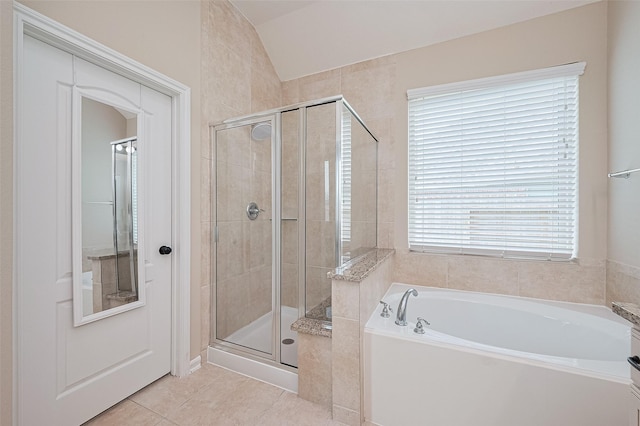 16747 Highland Country Dr, Cypress, TX 77433 - full bath with a bath, a stall shower, tile patterned flooring, and vaulted ceiling