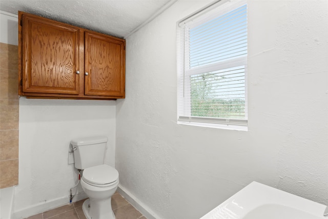 901 6th St, San Leon, TX 77539 - bathroom with toilet and tile patterned floors