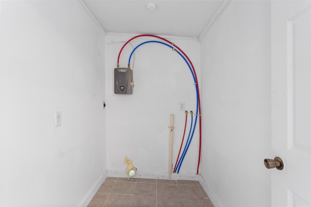901 6th St, San Leon, TX 77539 - laundry area with tile patterned floors and hookup for a washing machine