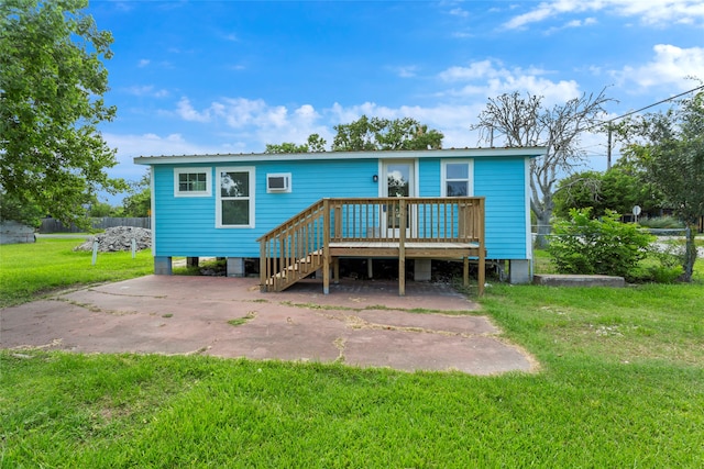 901 6th St, San Leon, TX 77539 - rear view of house featuring a wooden deck