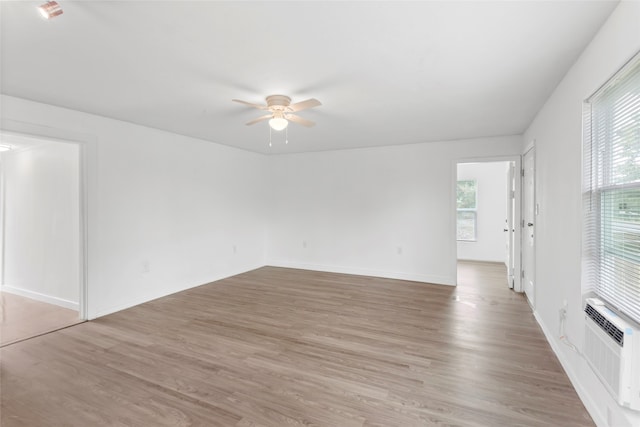 901 6th St, San Leon, TX 77539 - empty room featuring ceiling fan and light wood finished floors