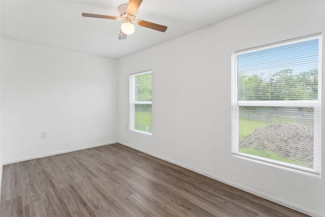 901 6th St, San Leon, TX 77539 - empty room featuring wood finished floors and ceiling fan