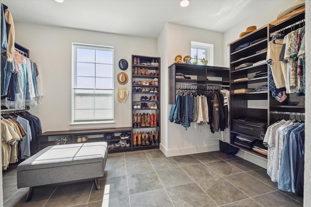 3116 Somerset Levens Ln, Houston, TX 77055 - walk in closet with tile patterned flooring