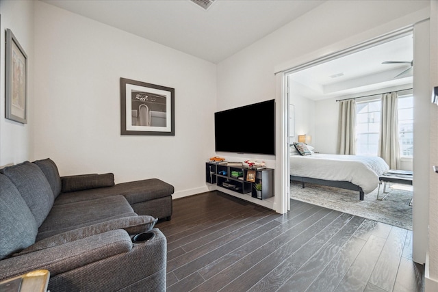 3116 Somerset Levens Ln, Houston, TX 77055 - living room featuring dark wood-style floors and ceiling fan
