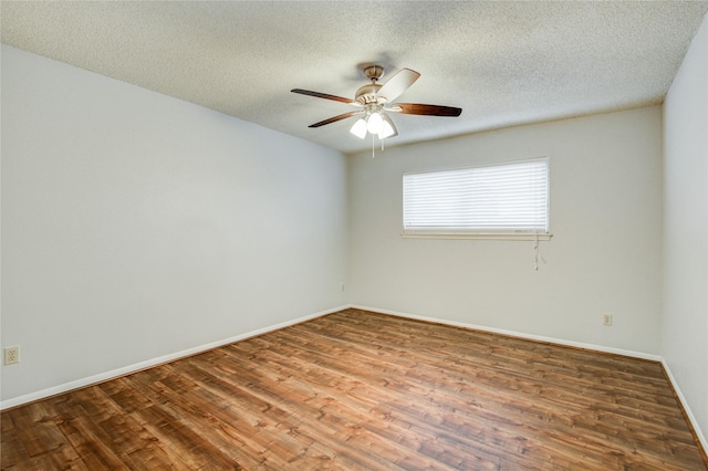 14123 Misty Meadow Ln, Houston, TX 77079 - spare room with wood finished floors, ceiling fan, and a textured ceiling