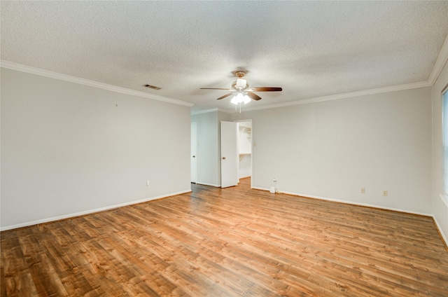 14123 Misty Meadow Ln, Houston, TX 77079 - empty room with ceiling fan, wood finished floors, a textured ceiling, and crown molding