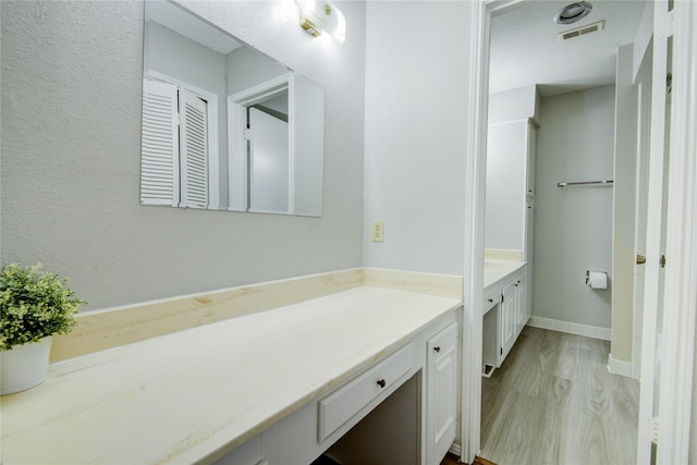 14123 Misty Meadow Ln, Houston, TX 77079 - bathroom featuring vanity and wood finished floors