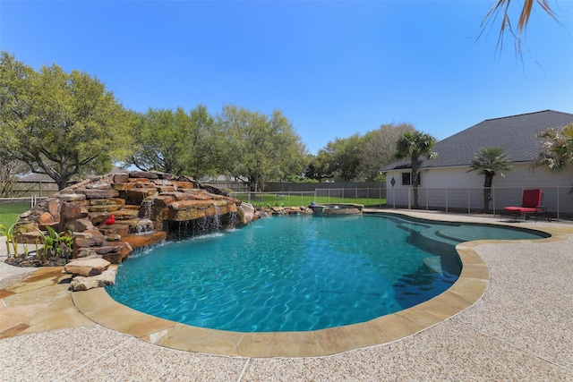 17310 Calico Peak Way, Cypress, TX 77433 - view of swimming pool with a fenced backyard, a pool with connected hot tub, and a patio area