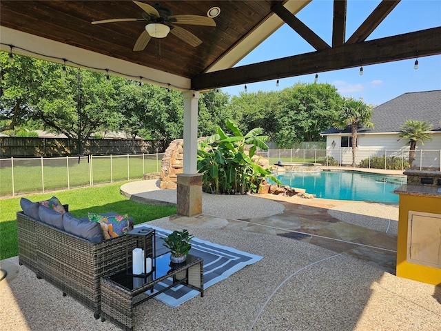 17310 Calico Peak Way, Cypress, TX 77433 - view of pool with a ceiling fan, a patio, a fenced backyard, and a pool with connected hot tub
