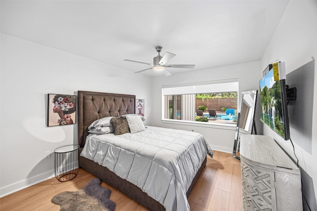 5122 Glenmeadow Dr, Houston, TX 77096 - bedroom with wood finished floors and a ceiling fan