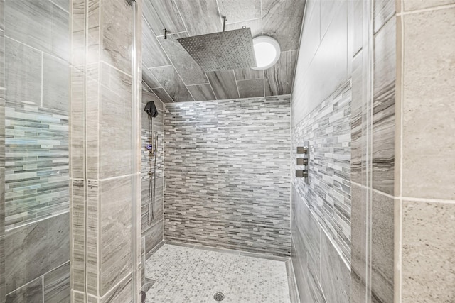 5122 Glenmeadow Dr, Houston, TX 77096 - bathroom featuring a shower stall and tile walls