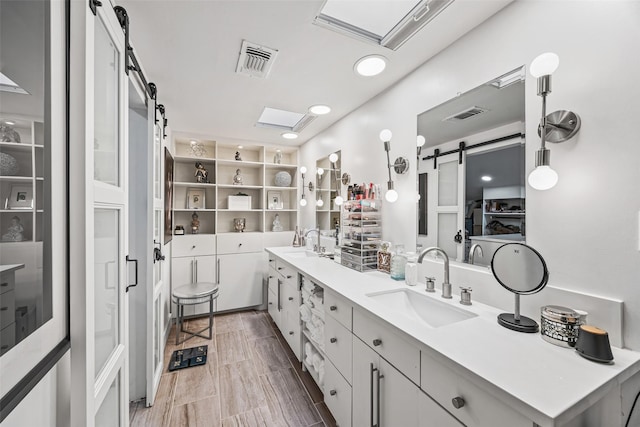 5122 Glenmeadow Dr, Houston, TX 77096 - bathroom with double vanity and a closet