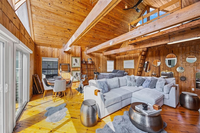 5122 Glenmeadow Dr, Houston, TX 77096 - living room featuring wooden walls, hardwood / wood-style flooring, healthy amount of natural light, a wood ceiling with exposed beams, and high vaulted ceiling
