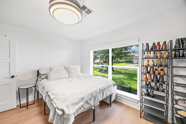 5122 Glenmeadow Dr, Houston, TX 77096 - bedroom featuring wood finished floors