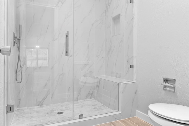 668 N Eldridge Pkwy, Houston, TX 77079 - bathroom with a marble finish shower and a textured wall