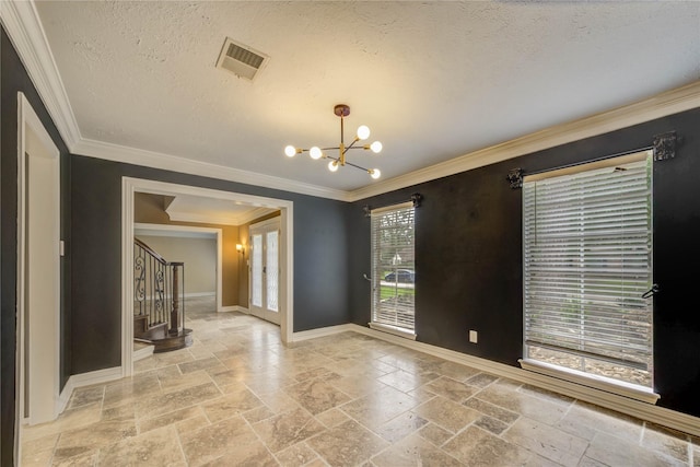 5307 Boyce Springs Dr, Houston, TX 77066 - spare room featuring stone tile flooring, stairway, a chandelier, a textured ceiling, and crown molding
