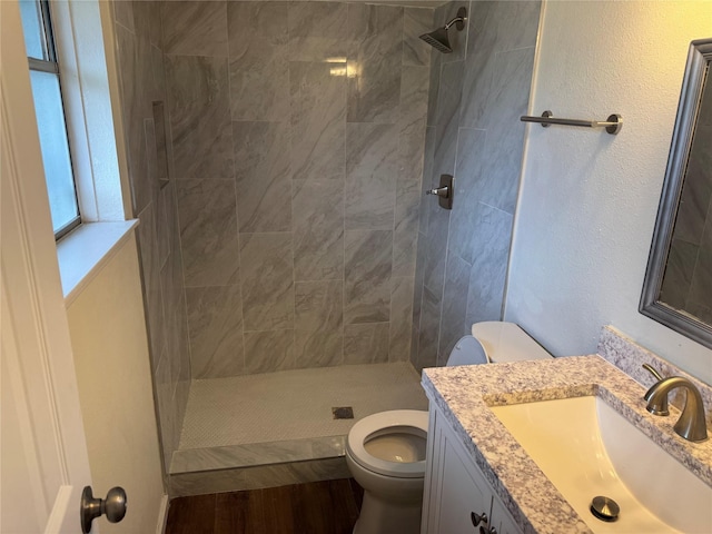 8446 Cabot St, Houston, TX 77078 - bathroom featuring vanity and tiled shower