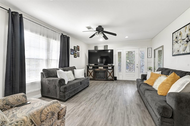 1802 Kowis St, Houston, TX 77093 - living area featuring healthy amount of natural light, light wood-style floors, a ceiling fan, and recessed lighting