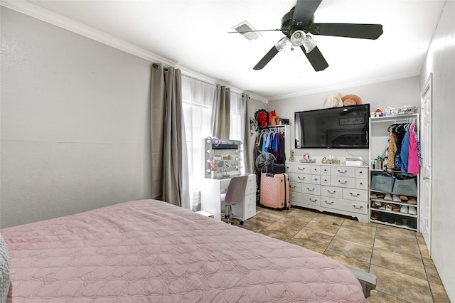 1802 Kowis St, Houston, TX 77093 - bedroom with ornamental molding, ceiling fan, and tile patterned floors