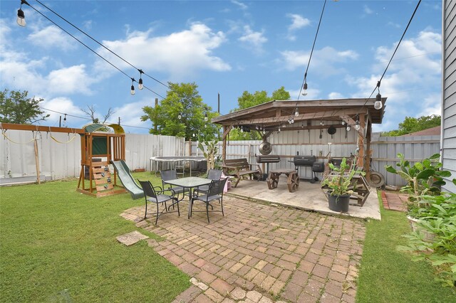 1802 Kowis St, Houston, TX 77093 - fenced backyard featuring a patio area, a playground, and a gazebo