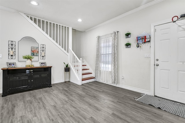 1802 Kowis St, Houston, TX 77093 - foyer entrance with stairway, wood finished floors, crown molding, and recessed lighting