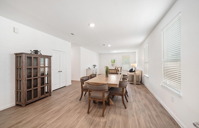 25565 Balsamroot Dr, Magnolia, TX 77355 - dining area with light wood-type flooring and recessed lighting