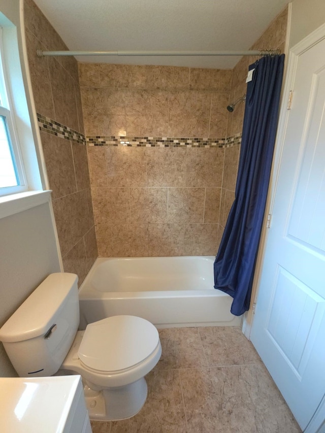 6227 Cavalier St Unit 770, Houston, TX 77087 - bathroom with shower / tub combo, vanity, and tile patterned flooring