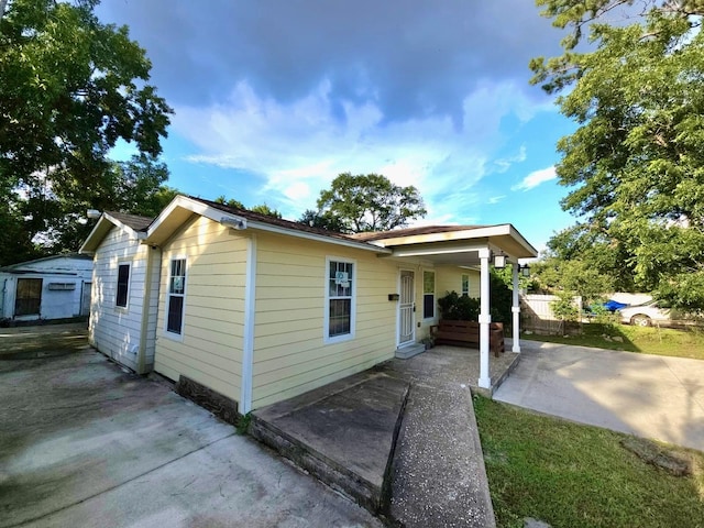 6227 Cavalier St Unit 770, Houston, TX 77087 - view of side of property with a patio area
