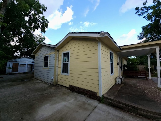 6227 Cavalier St Unit 770, Houston, TX 77087 - view of property exterior featuring a patio and an outbuilding