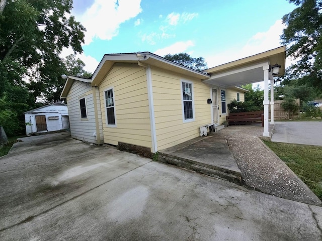 6227 Cavalier St Unit 770, Houston, TX 77087 - view of property exterior featuring a patio and an outdoor structure