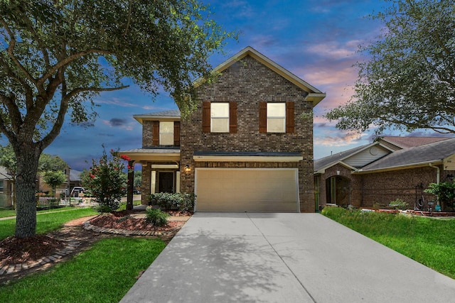 3811 Rosalind Ln, Houston, TX 77053 - traditional home featuring driveway, an attached garage, brick siding, and a front lawn