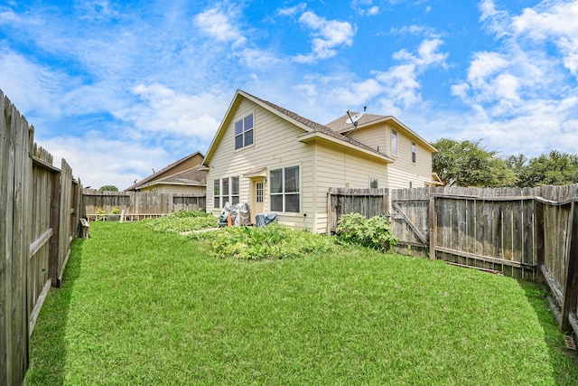 3811 Rosalind Ln, Houston, TX 77053 - rear view of house with a fenced backyard