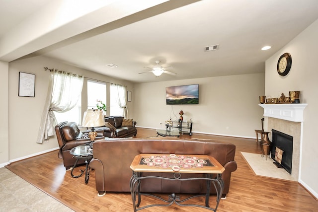 3811 Rosalind Ln, Houston, TX 77053 - living area featuring a ceiling fan, a fireplace with flush hearth, wood finished floors, and recessed lighting