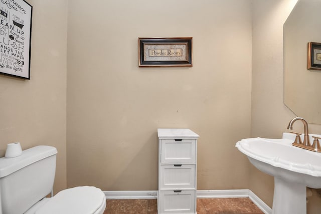 3811 Rosalind Ln, Houston, TX 77053 - half bath with toilet and tile patterned floors
