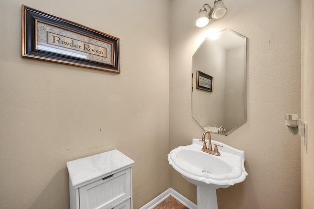 3811 Rosalind Ln, Houston, TX 77053 - bathroom with a sink and baseboards