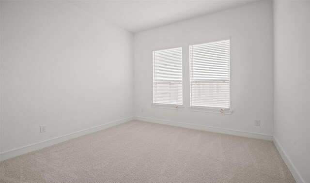 118 Luther Dean Ln, New Waverly, TX 77358 - spare room with light carpet and baseboards