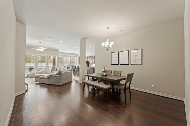 166 Hearthshire Cir, Magnolia, TX 77354 - dining space featuring dark wood finished floors, a chandelier, a ceiling fan, and recessed lighting