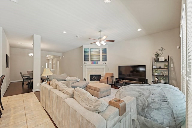 166 Hearthshire Cir, Magnolia, TX 77354 - living area featuring ceiling fan, recessed lighting, a tiled fireplace, and wood finished floors