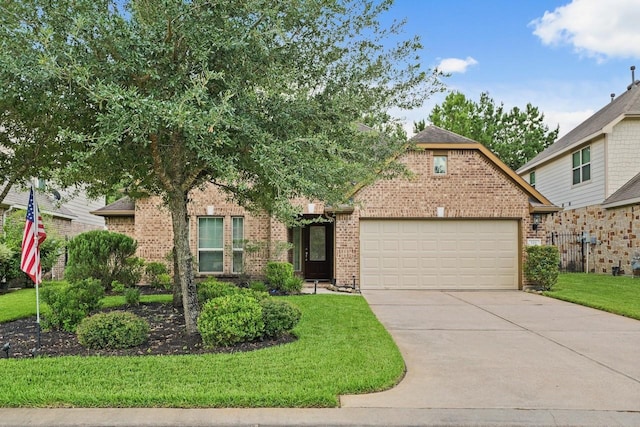 166 Hearthshire Cir, Magnolia, TX 77354 - view of front of home with brick siding, concrete driveway, a garage, and a front lawn