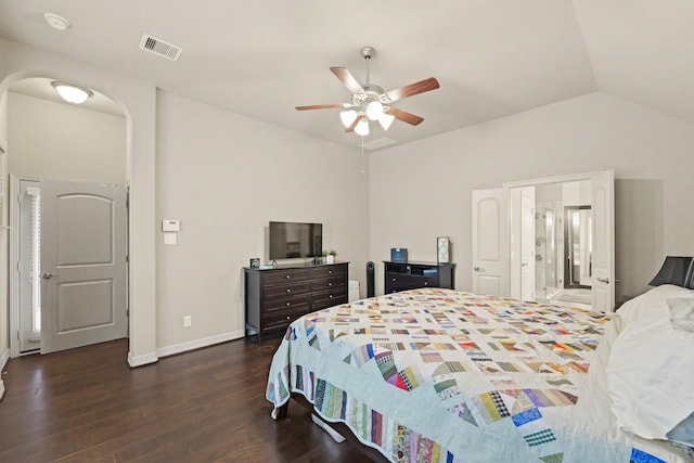 166 Hearthshire Cir, Magnolia, TX 77354 - bedroom featuring wood finished floors, lofted ceiling, arched walkways, ceiling fan, and connected bathroom
