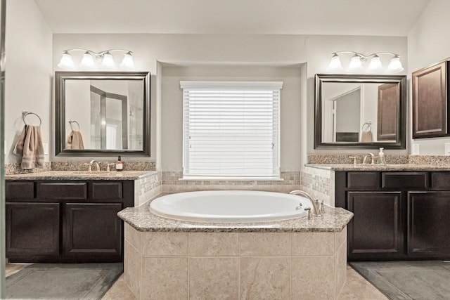 166 Hearthshire Cir, Magnolia, TX 77354 - full bath featuring a bath, two vanities, and tile patterned flooring