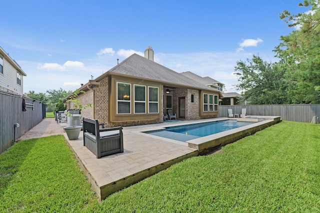 166 Hearthshire Cir, Magnolia, TX 77354 - rear view of property with brick siding, a patio, a fenced backyard, and a chimney