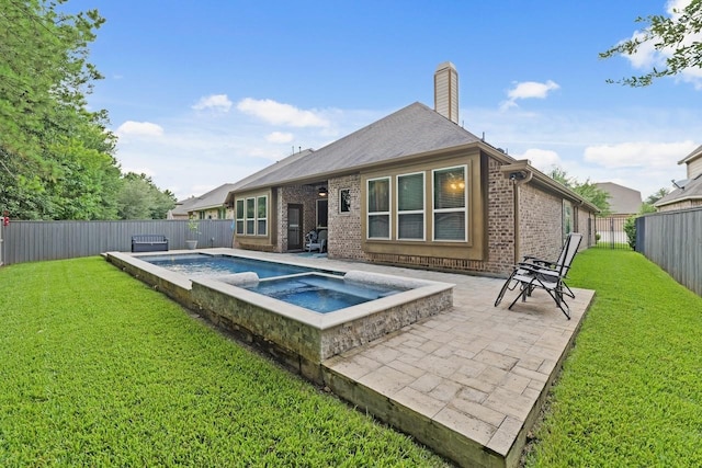 166 Hearthshire Cir, Magnolia, TX 77354 - rear view of house with brick siding, a fenced backyard, a chimney, a patio, and a pool with connected hot tub