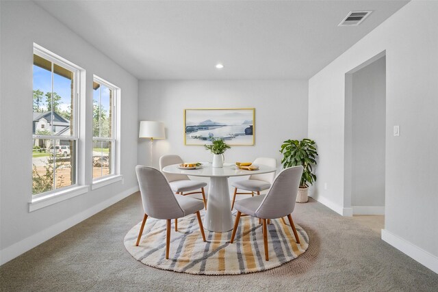 3040 Mesquite Pod Trl, Conroe, TX 77301 - dining space with carpet floors and recessed lighting