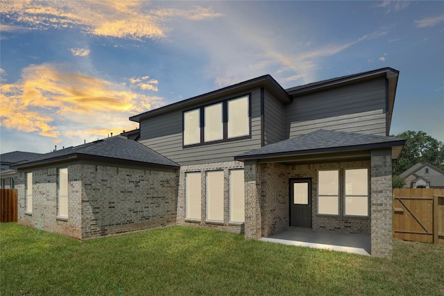 3040 Mesquite Pod Trl, Conroe, TX 77301 - rear view of property with brick siding and roof with shingles