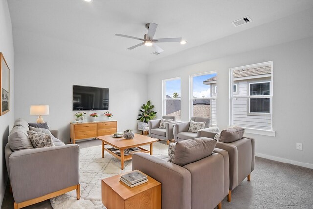 3040 Mesquite Pod Trl, Conroe, TX 77301 - living room with a ceiling fan, light colored carpet, and lofted ceiling