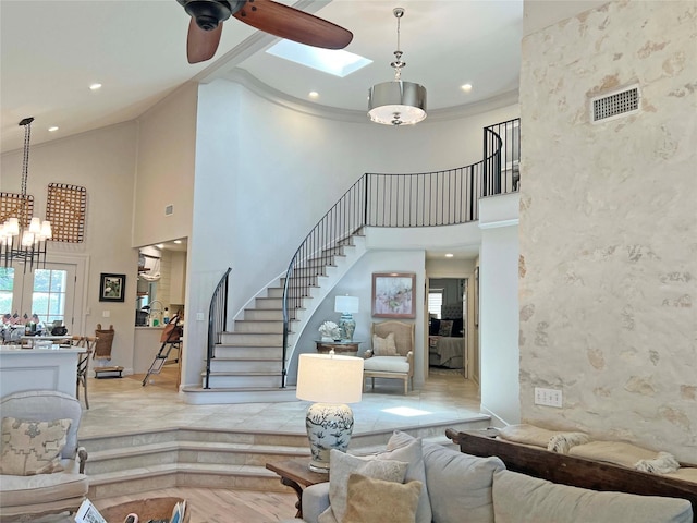 1234 Challenger, Lakeway, TX 78734 - living area featuring high vaulted ceiling, stairway, a chandelier, recessed lighting, and ornamental molding