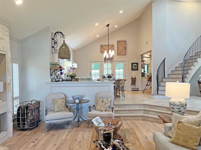 1234 Challenger, Lakeway, TX 78734 - living room featuring high vaulted ceiling, wood-type flooring, stairway, a chandelier, and recessed lighting