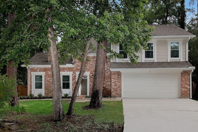 3 Meadow Beauty, The Woodlands, TX 77381 - view of front of property with driveway, roof with shingles, brick siding, and a garage